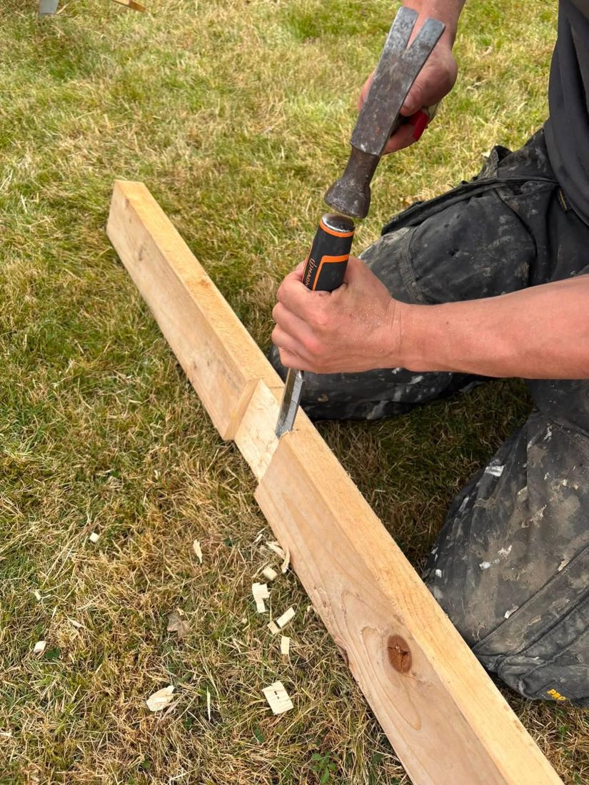 Chiselling out a housing joint in a length of timber